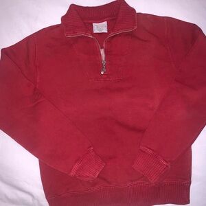 Deep red sweater